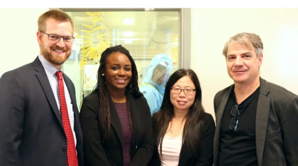 Dr. Xiangguo Qiu with her team at Canada's National Microbiology Laboratory