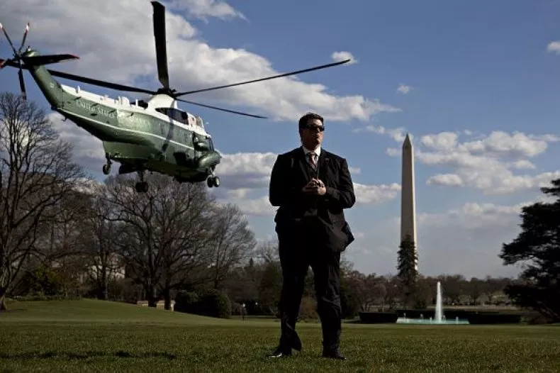 A member of the Secret Service stands guard as Marine One, with President Donald Trump on board, departs the South Lawn of the White House on March 23. A new report by National Geographic details an attempted assassination last year by ISIS operatives against Trump that was stopped by the Secret Service.